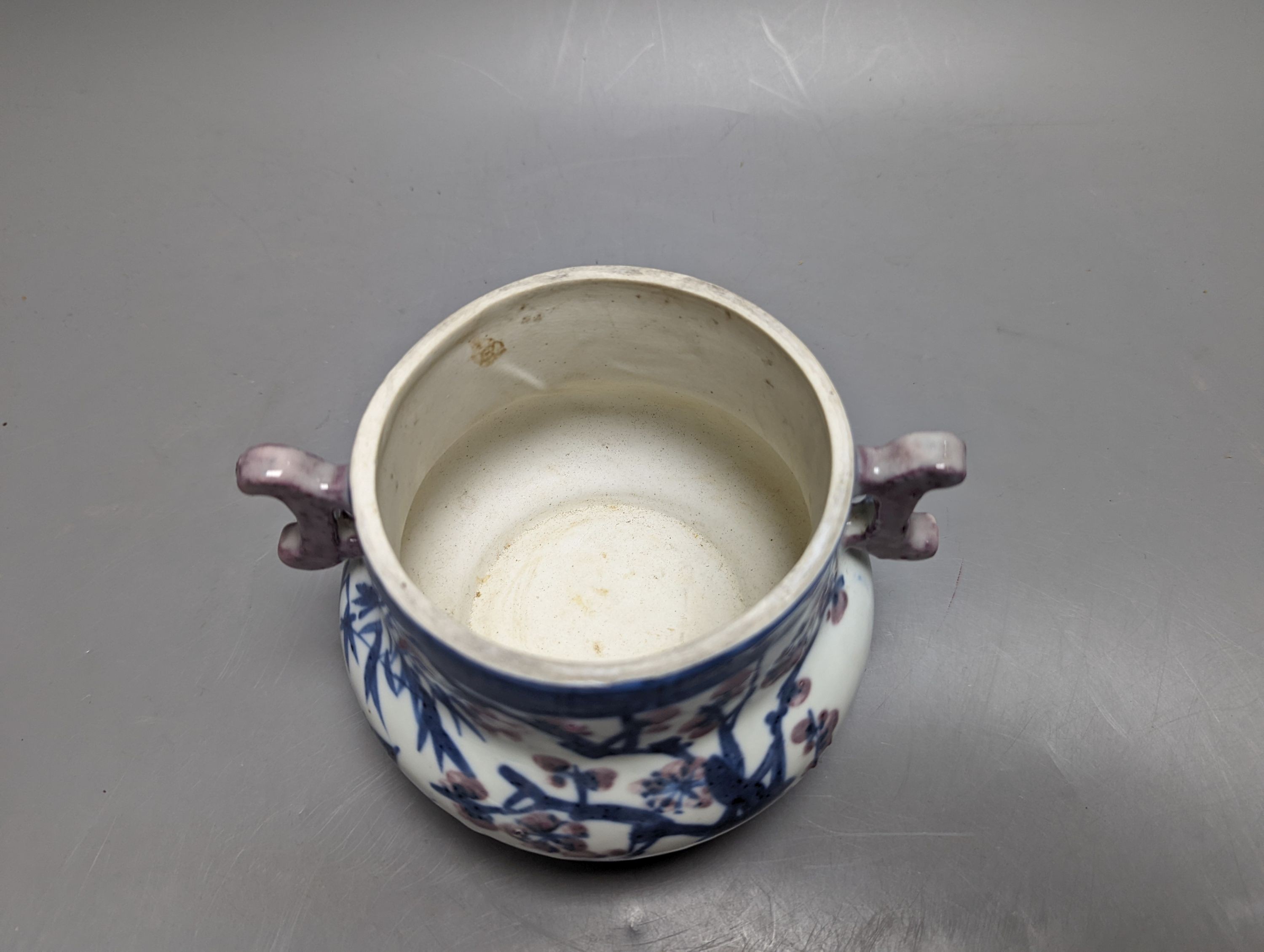 A Chinese underglaze blue and copper red jar and cover, Xuande six character mark but later 12cm